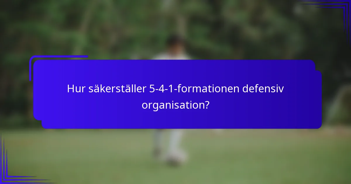 Hur säkerställer 5-4-1-formationen defensiv organisation?